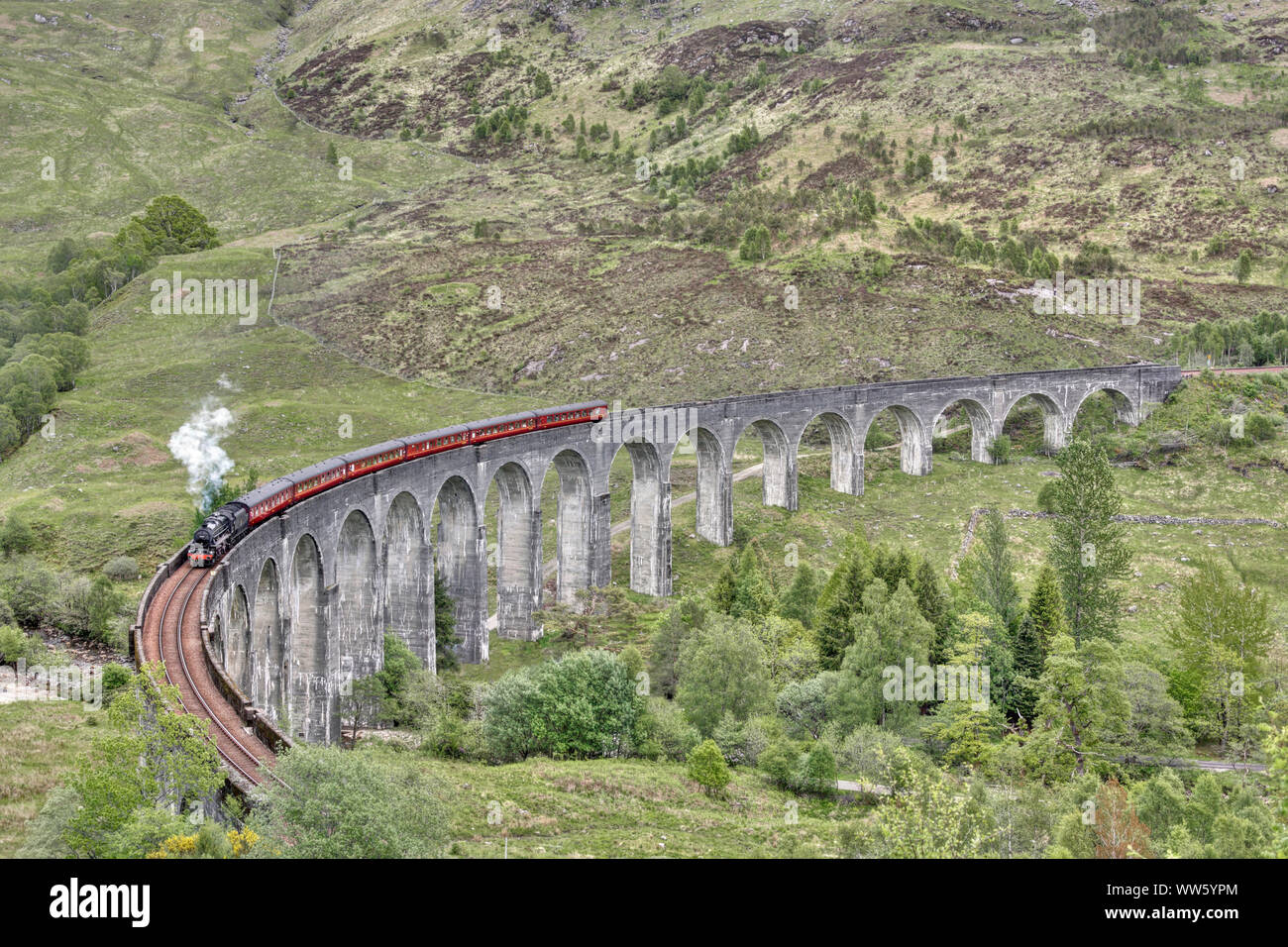England, Scotland, Highlands, Glenvinnan, Highlands, train crossing bridge, steam locomotive Stock Photo