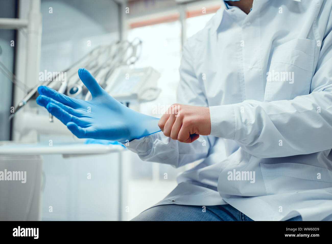 Close up closeup blue surgical glove gloves gloved latex hires stock