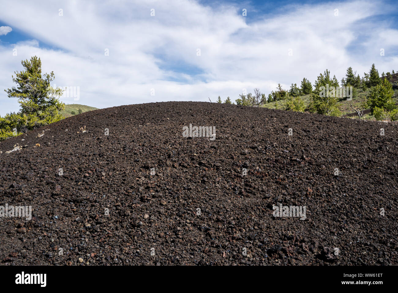 Hill of black volcanic rock at Crateres of the Moon National Monument