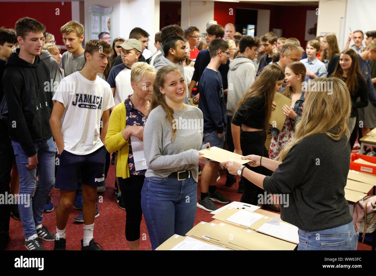 Students picking up their envelopes, at GCSE results day at Balcarras Academy, Cheltenham. 22/08/2019 Picture by Andrew Higgins - Thousand Word Media, Stock Photo