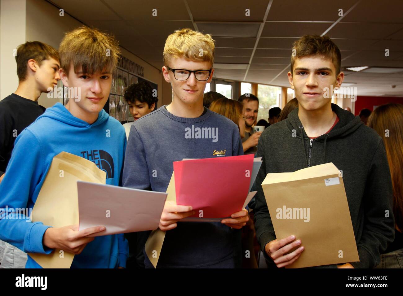 Friends Pablo Vega, Billy Cropper and Charlie Hughes at GCSE results day at Balcarras Academy, Cheltenham. 22/08/2019 Picture by Andrew Higgins - Thou Stock Photo
