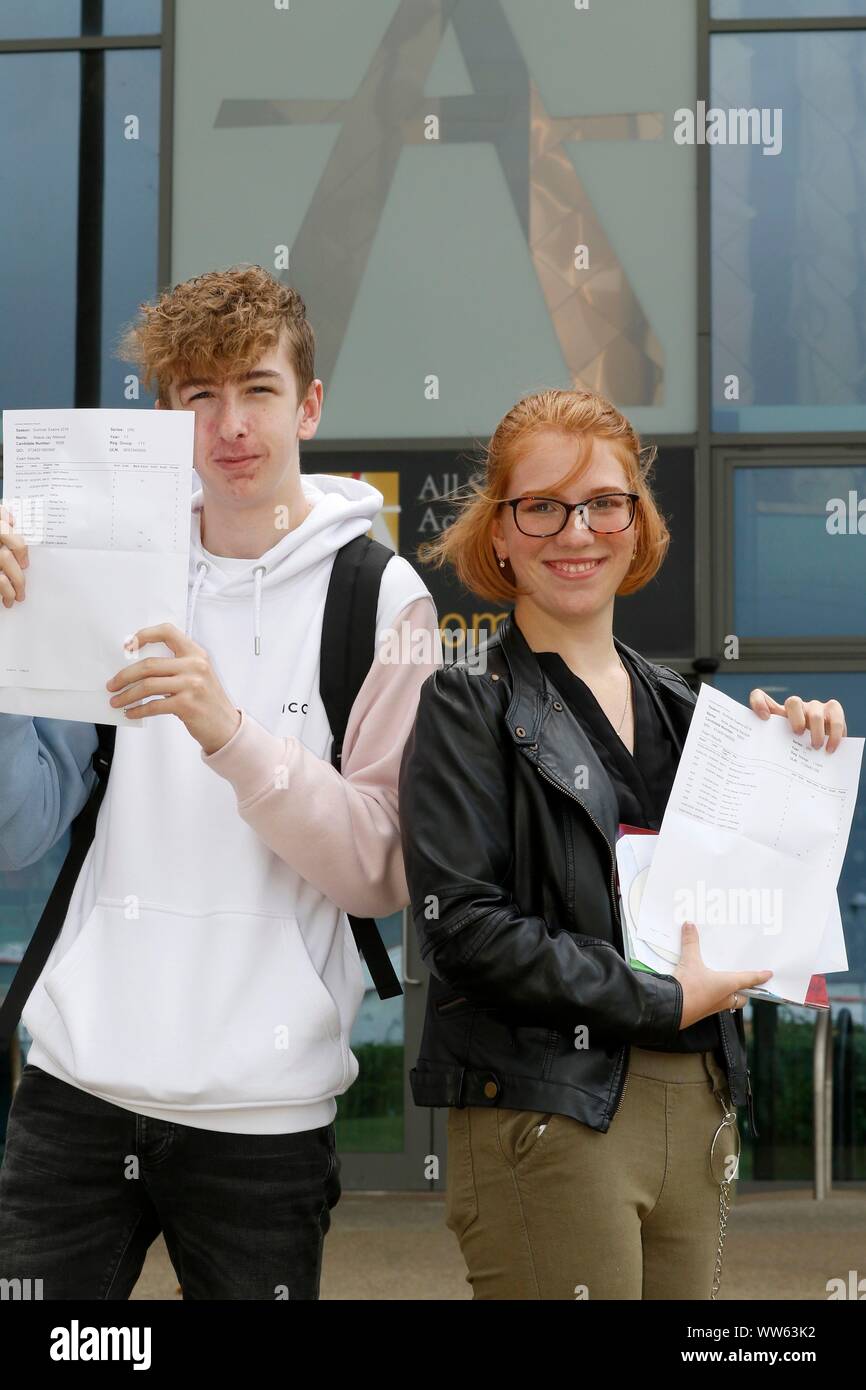 Top results for Reece Attwood (a 9, three 8s, and three 7 grades) and Amie Adcock (three 9s, and five 8 grades) at GCSE results day at All Saints Acad Stock Photo