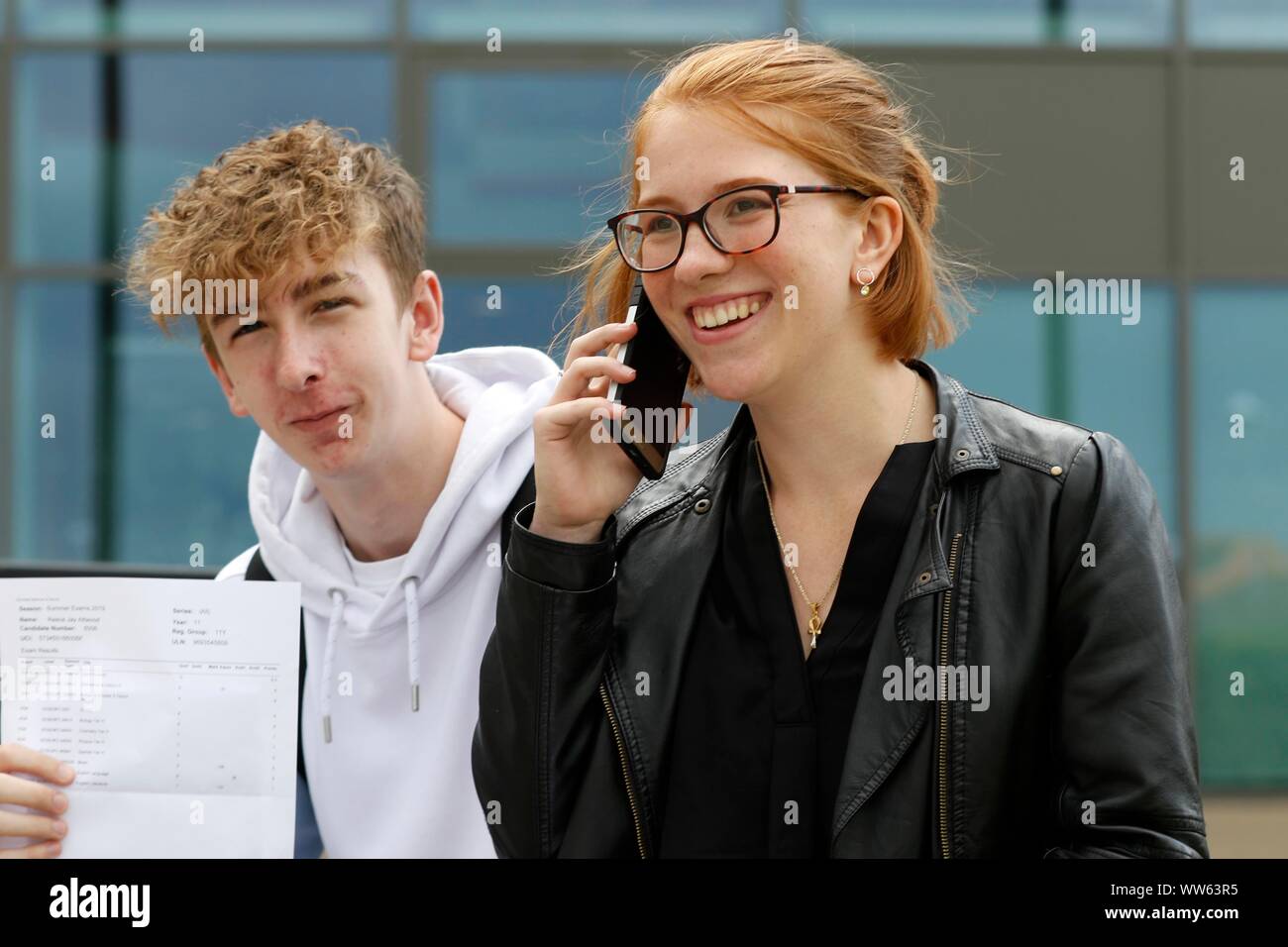 Top results for Reece Attwood (a 9, three 8s, and three 7 grades) and Amie Adcock (three 9s, and five 8 grades) at GCSE results day at All Saints Acad Stock Photo