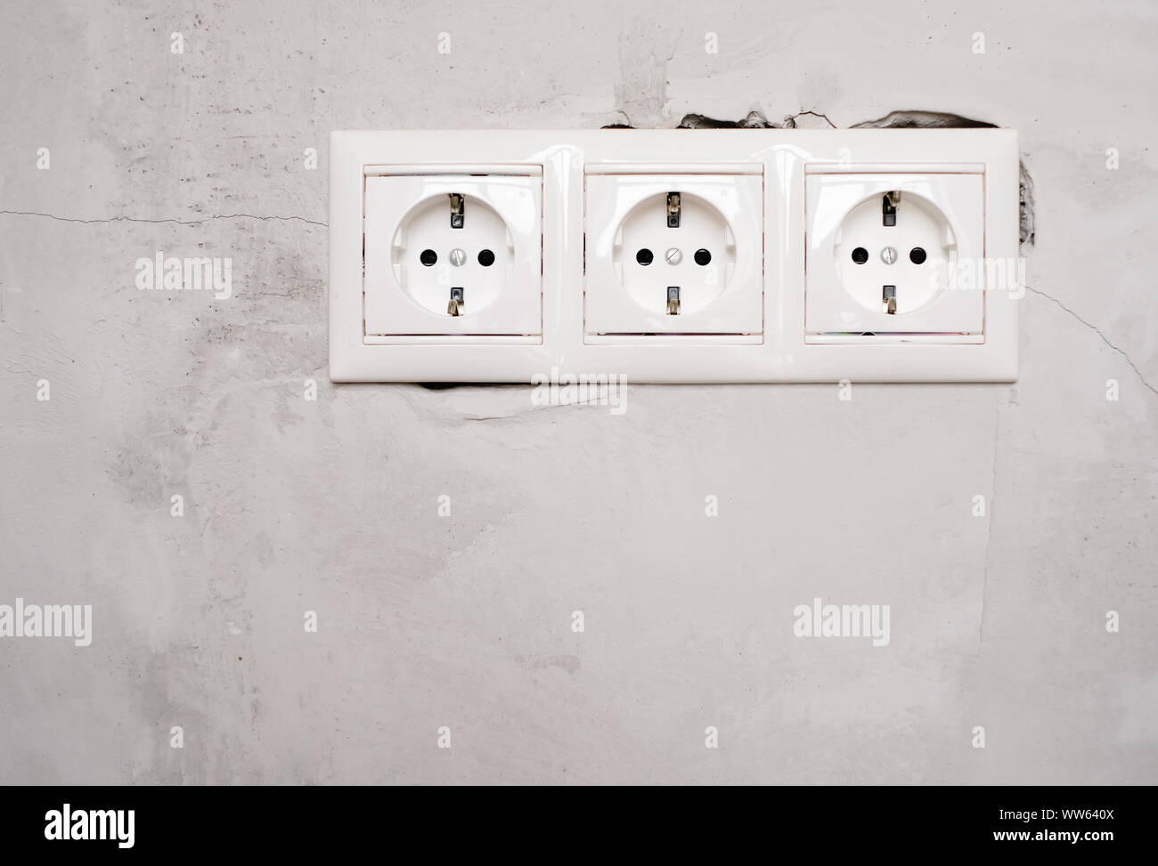 Electric Eu Socket Outlet On Gray Concrete Wall Background Repair In An Apartment Or In Office Replacement Of Electrical Wiring Close Up View Stock Photo Alamy