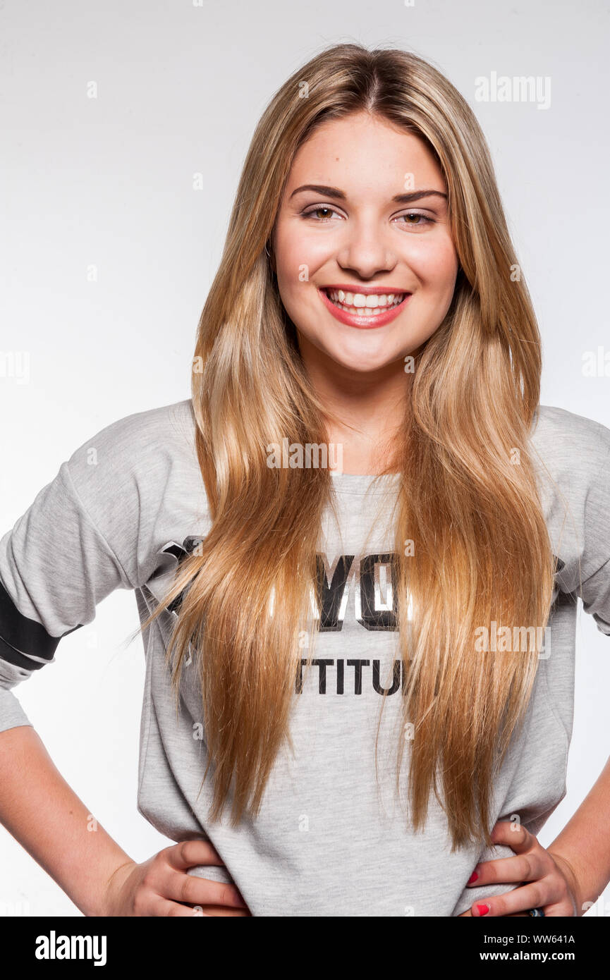 Happy young woman braces hi-res stock photography and images - Alamy