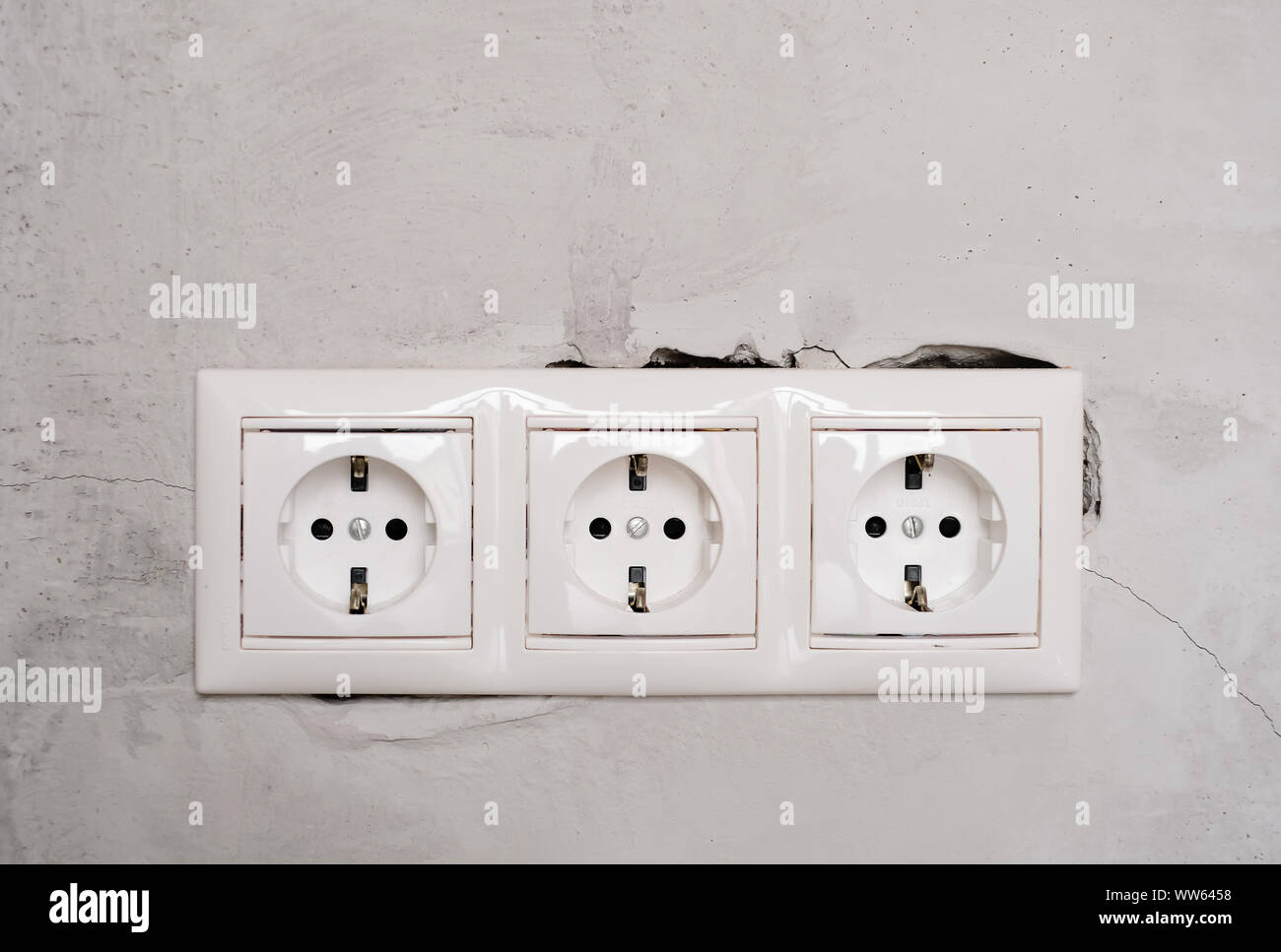Electric Eu Socket Outlet On Gray Concrete Wall Background Repair In An Apartment Or In Office Replacement Of Electrical Wiring Close Up View Stock Photo Alamy