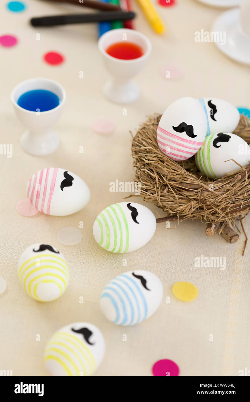 Easter nest, eggcup, dyeing and painting Easter eggs, Easter egg colour Stock Photo
