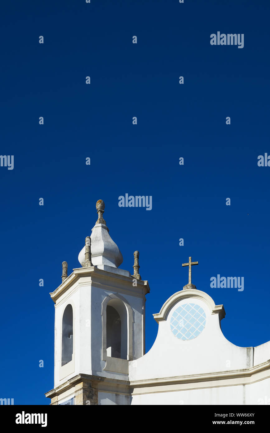 White church with roof bricks in front of blue sky hi-res stock ...
