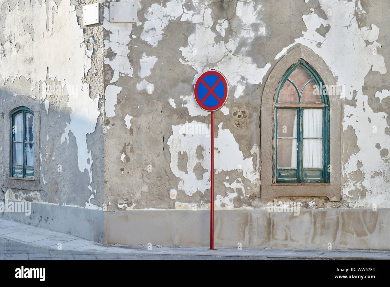 No parking sign on street, wall of a house, window, Gothic Stock Photo