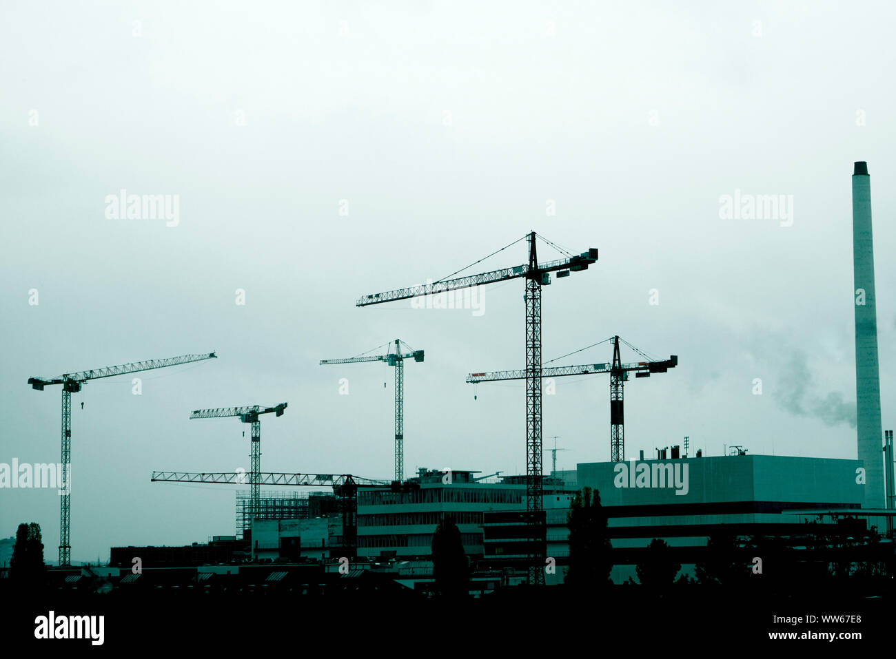 Crane on construction site in the city of Basel, skyline Stock Photo
