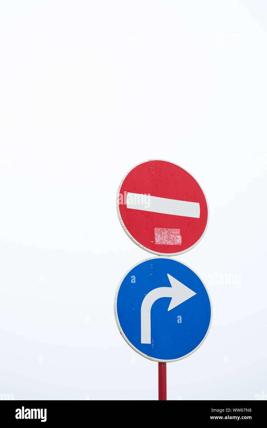 Signs, No entry for vehicular traffic, red, arrow turn right blue, copy space Stock Photo