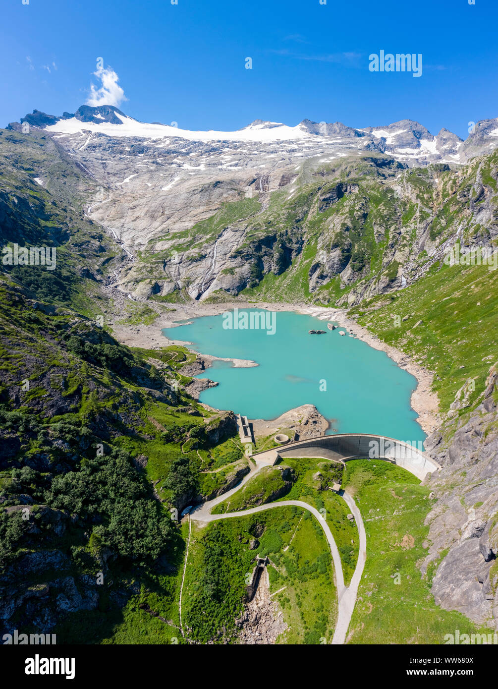 Aerial view of Basodino glacier and Lago del Zott with its dam, Robiei, Bavona valley, Maggia Valley, Lepontine Alps, Canton Ticino, Switzerland. Stock Photo