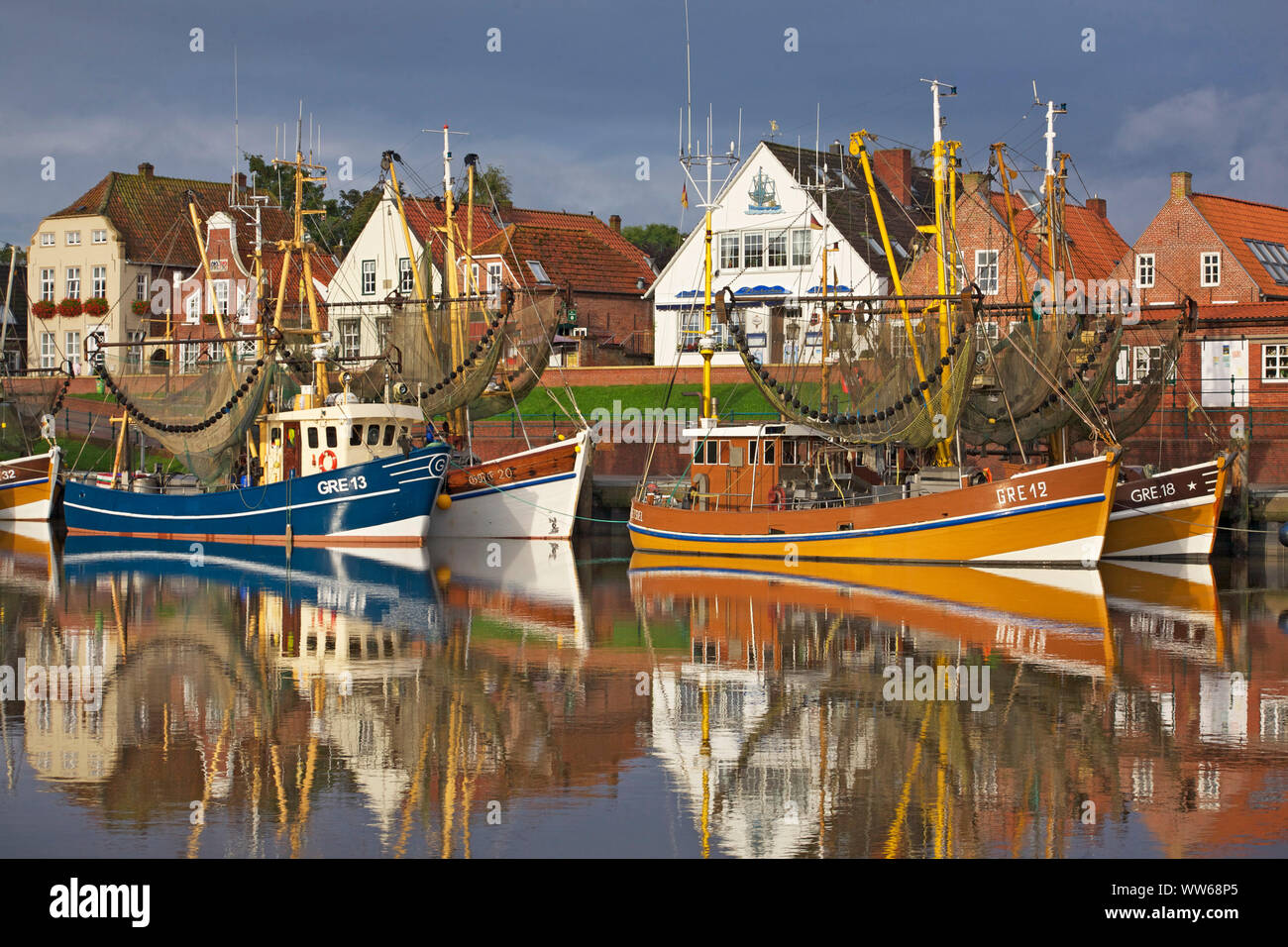 Morning at the shrimp boat harbour of Greetsiel in East Friesland. Stock Photo