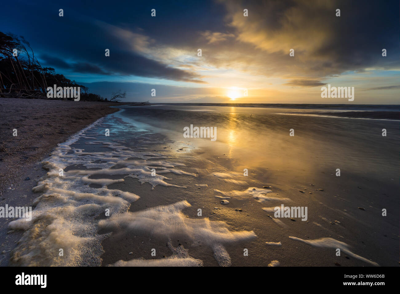 Baltic Sea at evening light and long exposure, setting sun Stock Photo