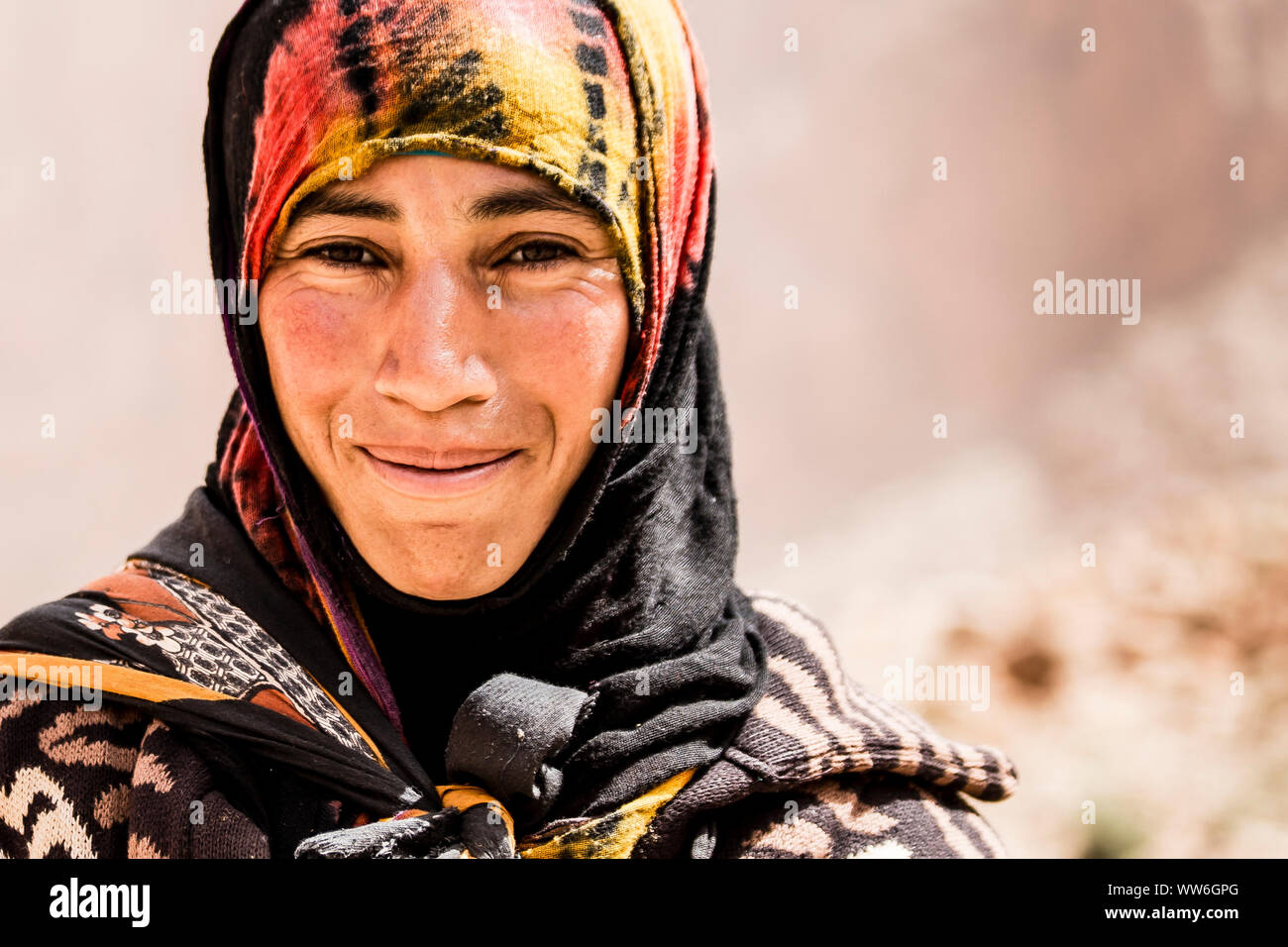 Shepherdess in the High Atlas, smiling, looking into the camera, Morocco Stock Photo