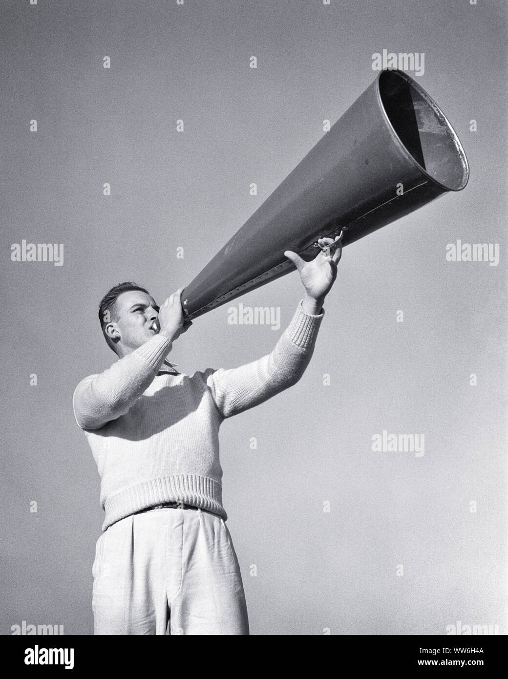 Person speaking megaphone crowd hires stock photography and images Alamy