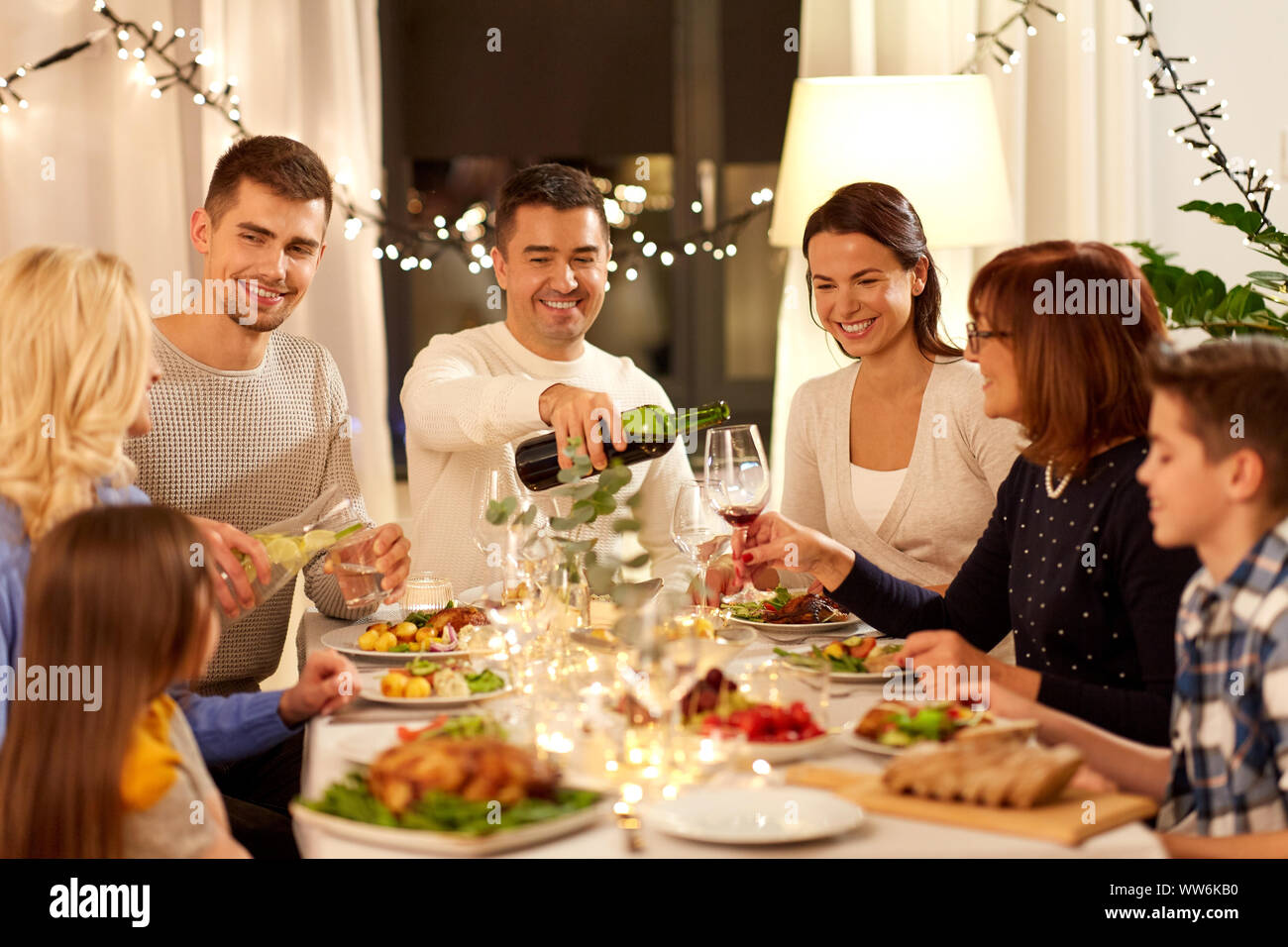 happy family having dinner party at home Stock Photo