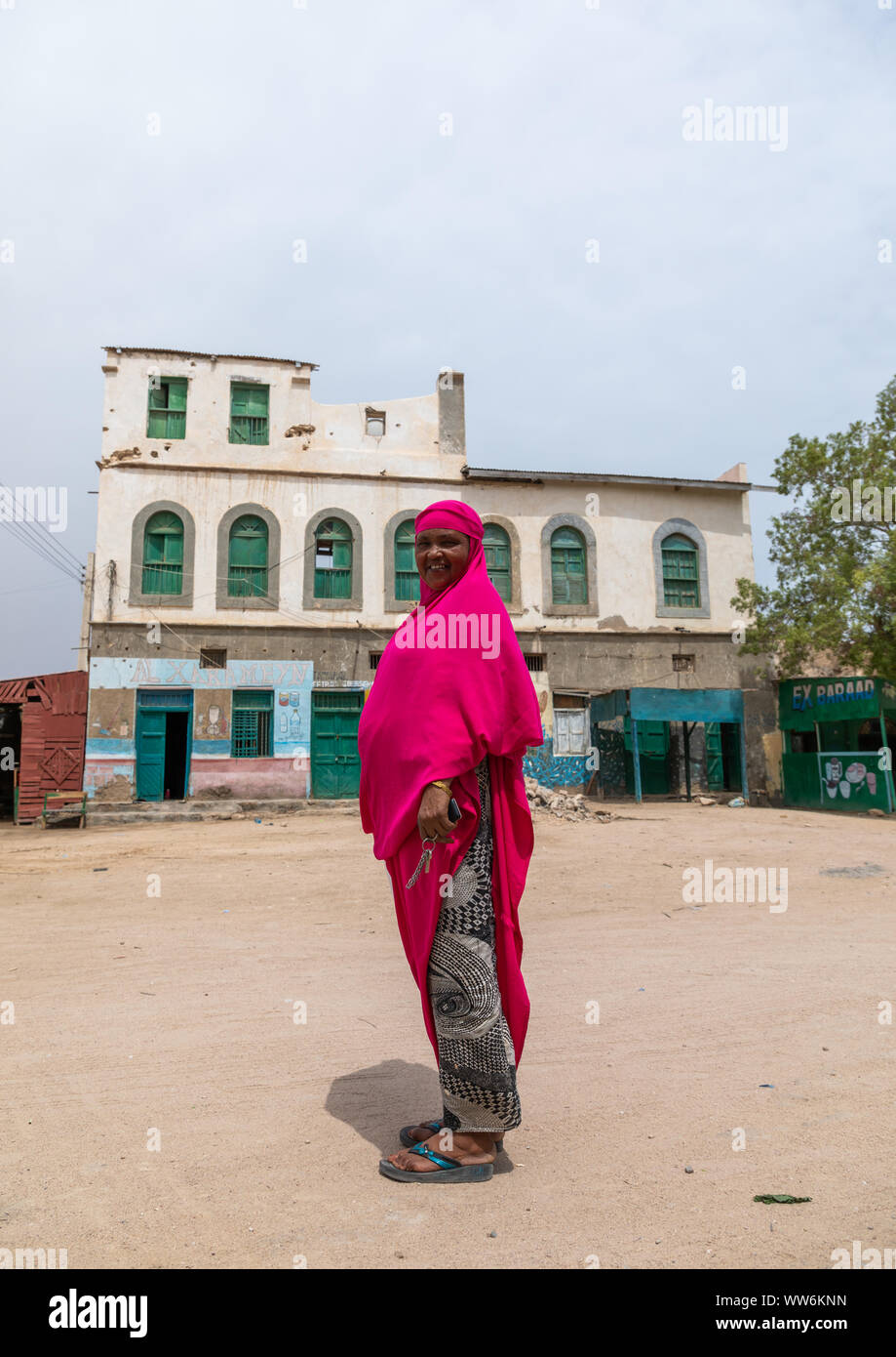 Somali woman in front of old ottoman houses, Sahil region, Berbera ...