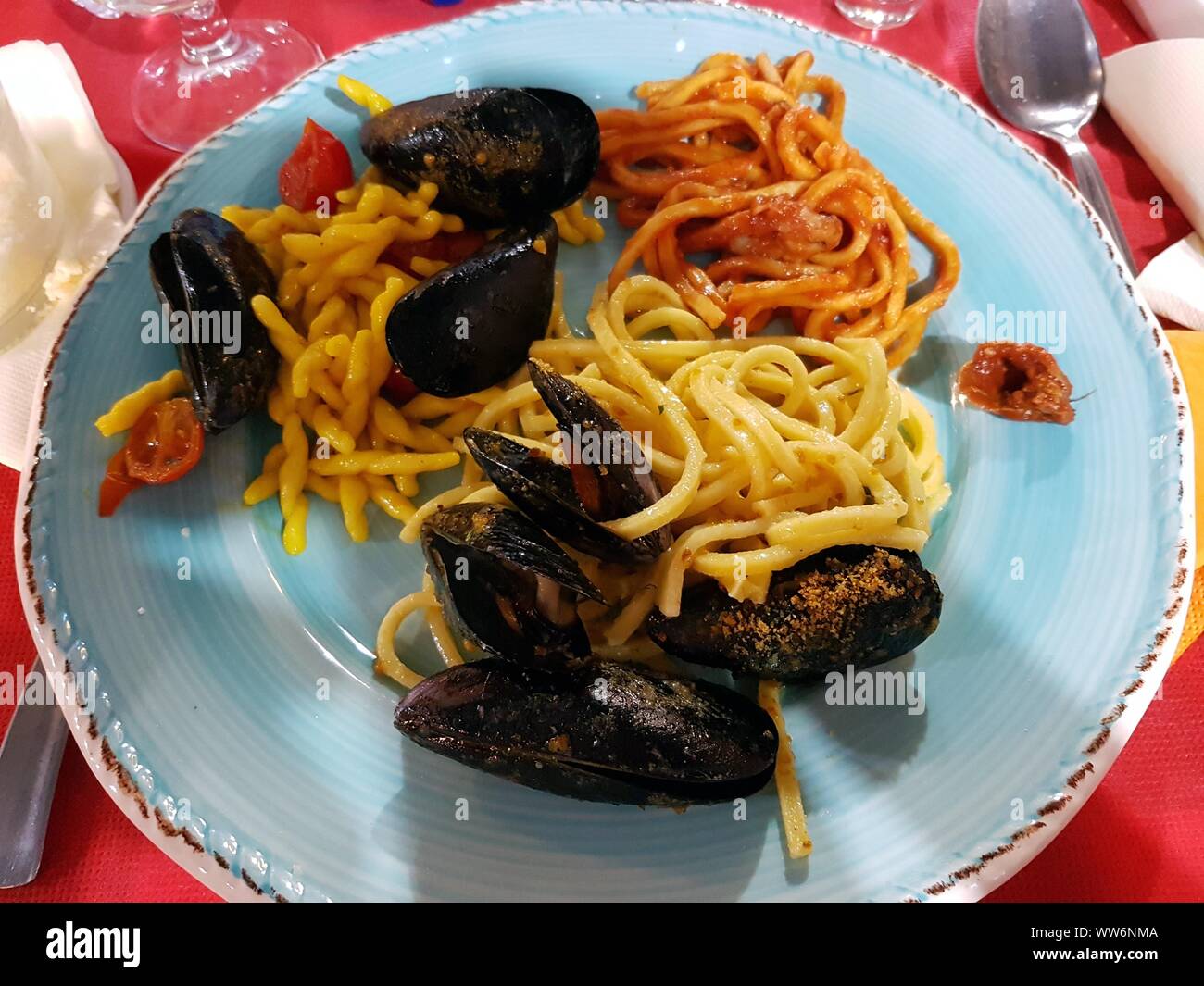 photo of pasta dishes with mussels during this summer Stock Photo