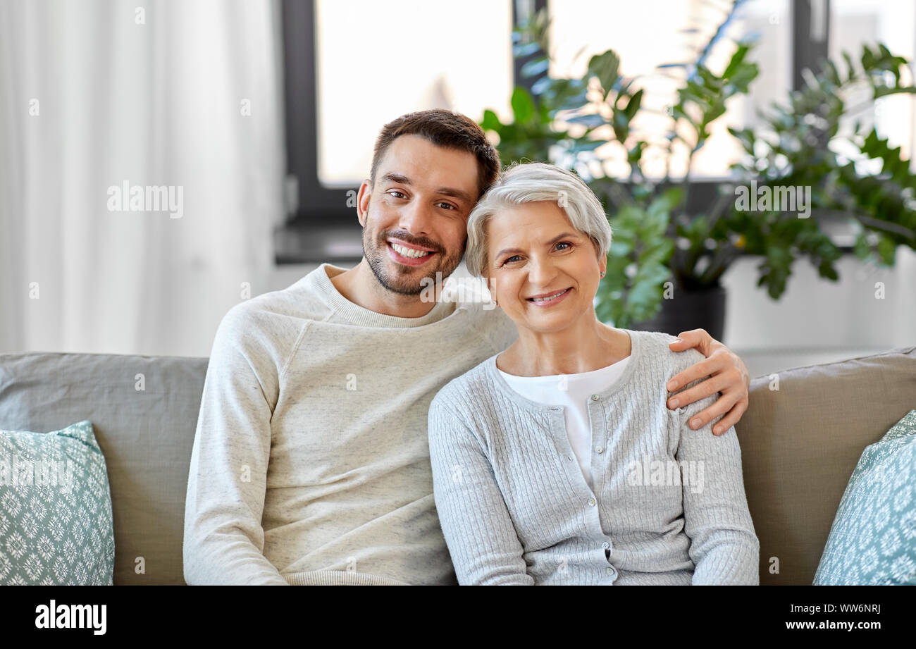 Son hugging elderly mother hi-res stock photography and images - Alamy