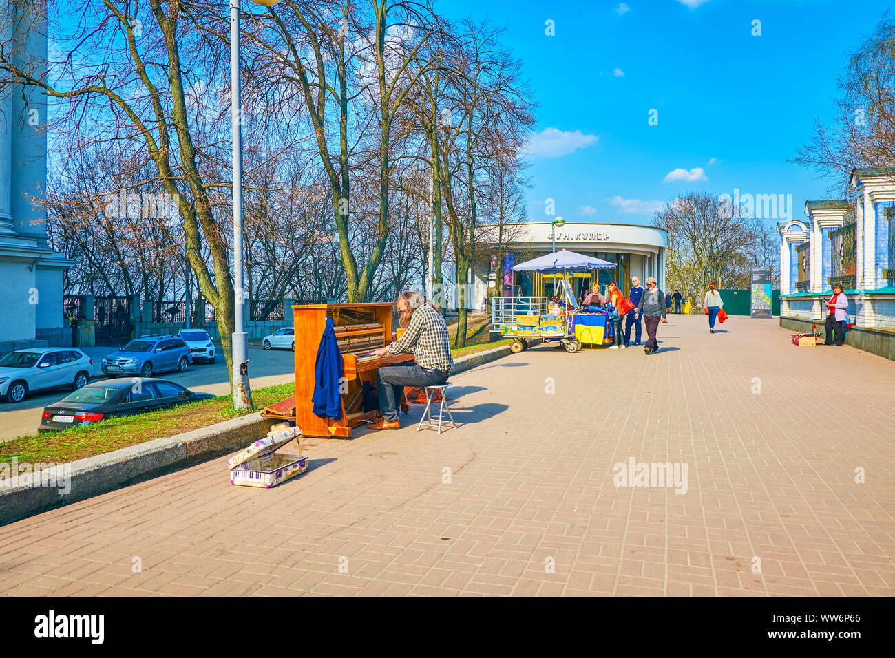 KIEV, UKRAINE - APRIL 13, 2018: The street musician plays piano in park, located on Saint Vladimir's Hill next to the upper funicular station, on Apri Stock Photo