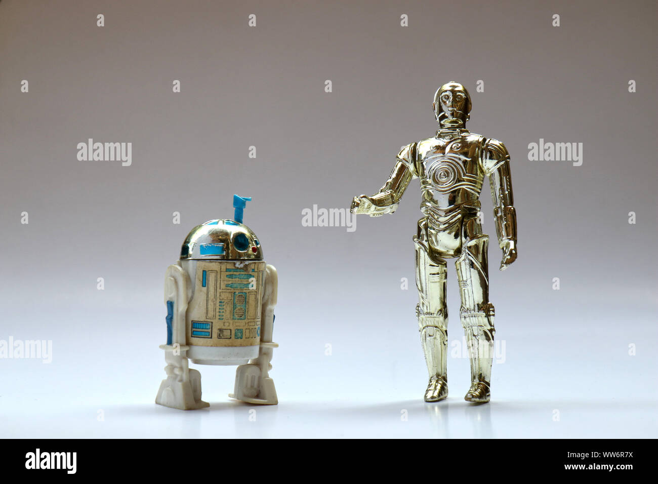 BERLIN - AUGUST 29, 2019: Vintage Star Wars C-3PO and R2D2 with Sensorscope Action Figures from Kenner Toys on White. This was released with the Movie Stock Photo