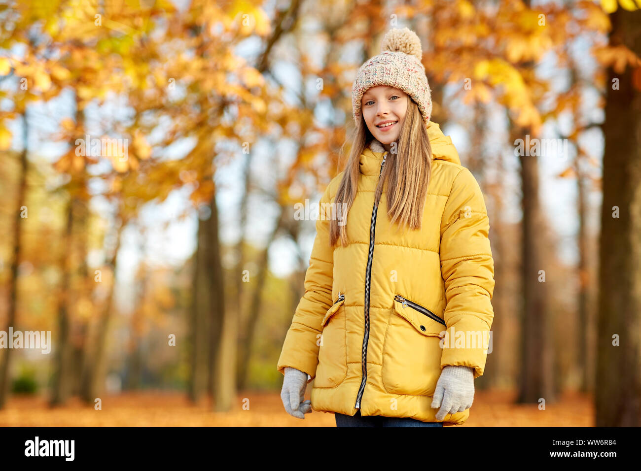 happy girl at autumn park Stock Photo - Alamy