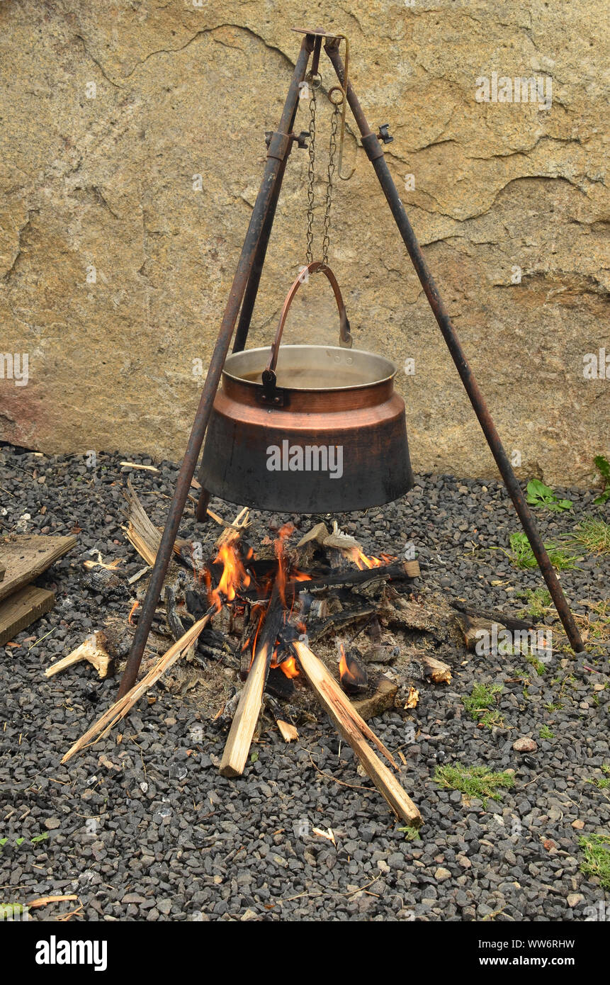 Kettle over the fire and smoky, delicious mushroom goulash inside Stock Photo Alamy