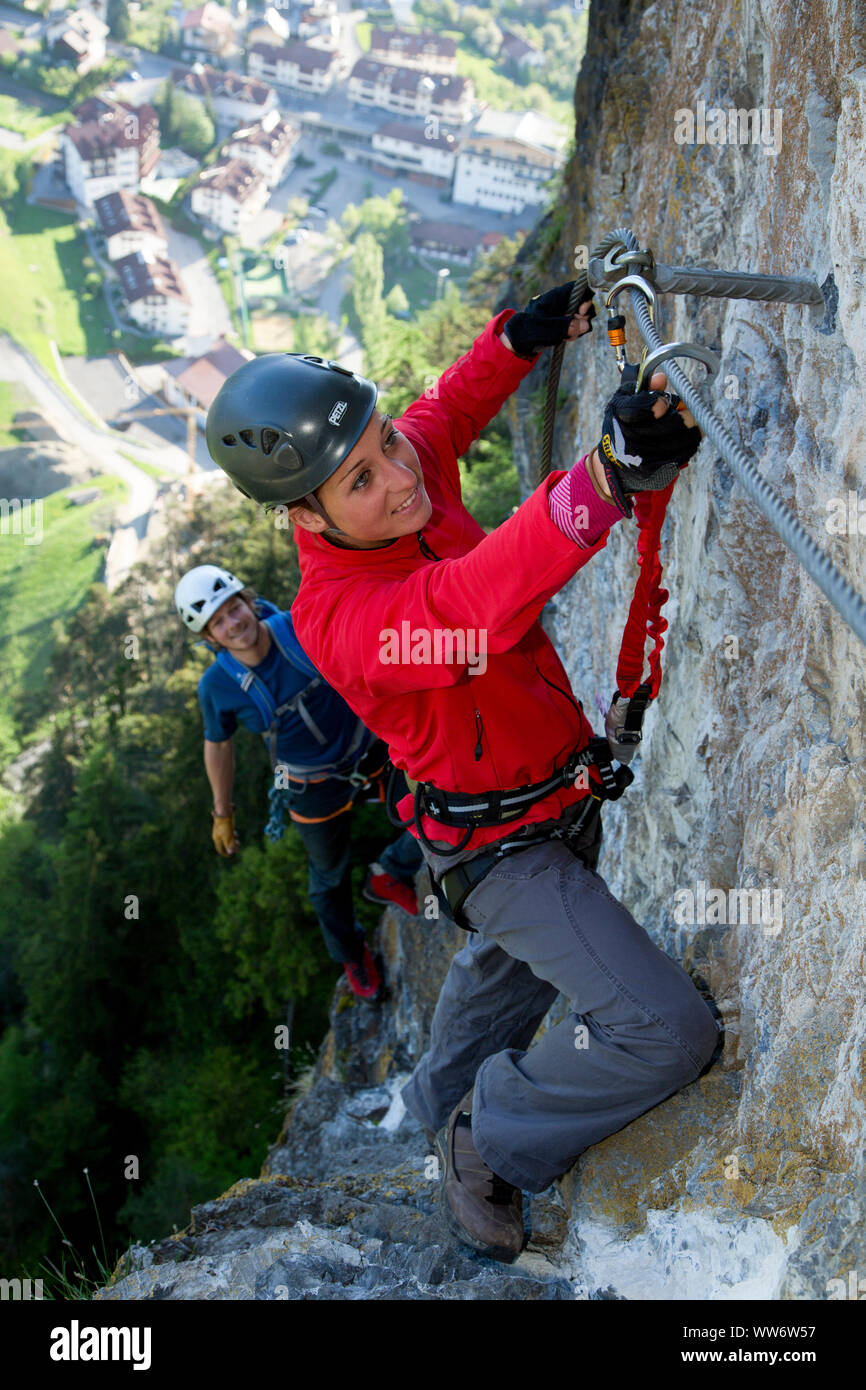 Climber on Steinwand via ferrata near Arzl, Pitztal, Tyrol, Austria. Stock Photo