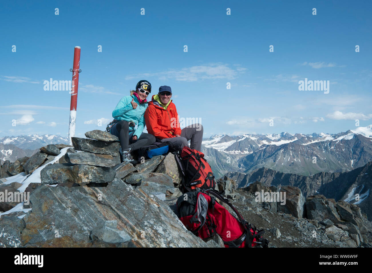 Couple at the summit of the Verpeilspitze, Kaunergrat, Ã–tztaler Alps, Tyrol, Austria Stock Photo