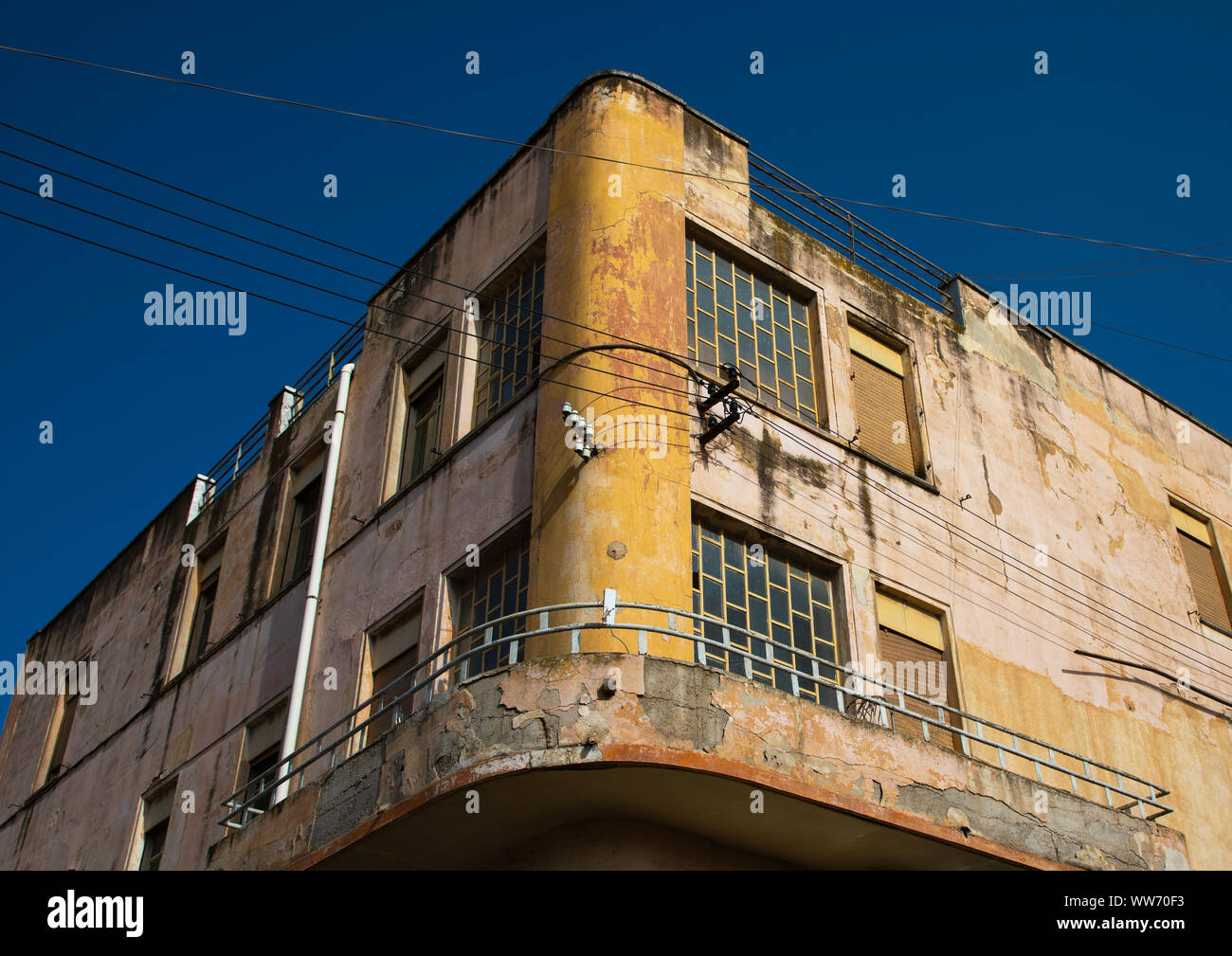 Exterior of old art deco style building from the italian colonial times ...