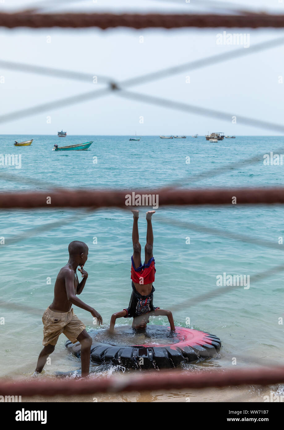 Somali children playing in the sea, Sahil region, Berbera, Somaliland Stock Photo