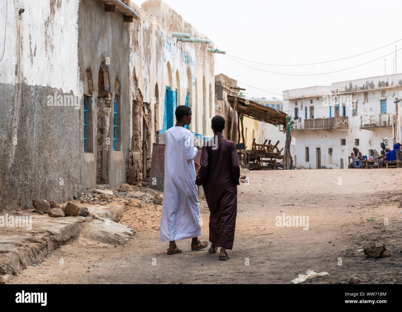 Somali men walking in the old town, Sahil region, Berbera, Somaliland Stock Photo