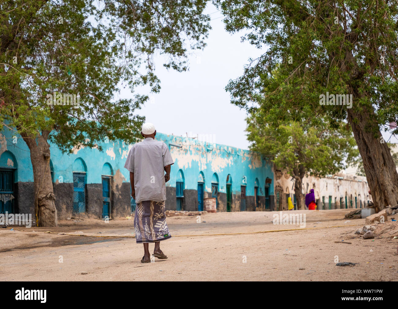 Old somali man walking in the streets of the old town, Sahil region, Berbera, Somaliland Stock Photo