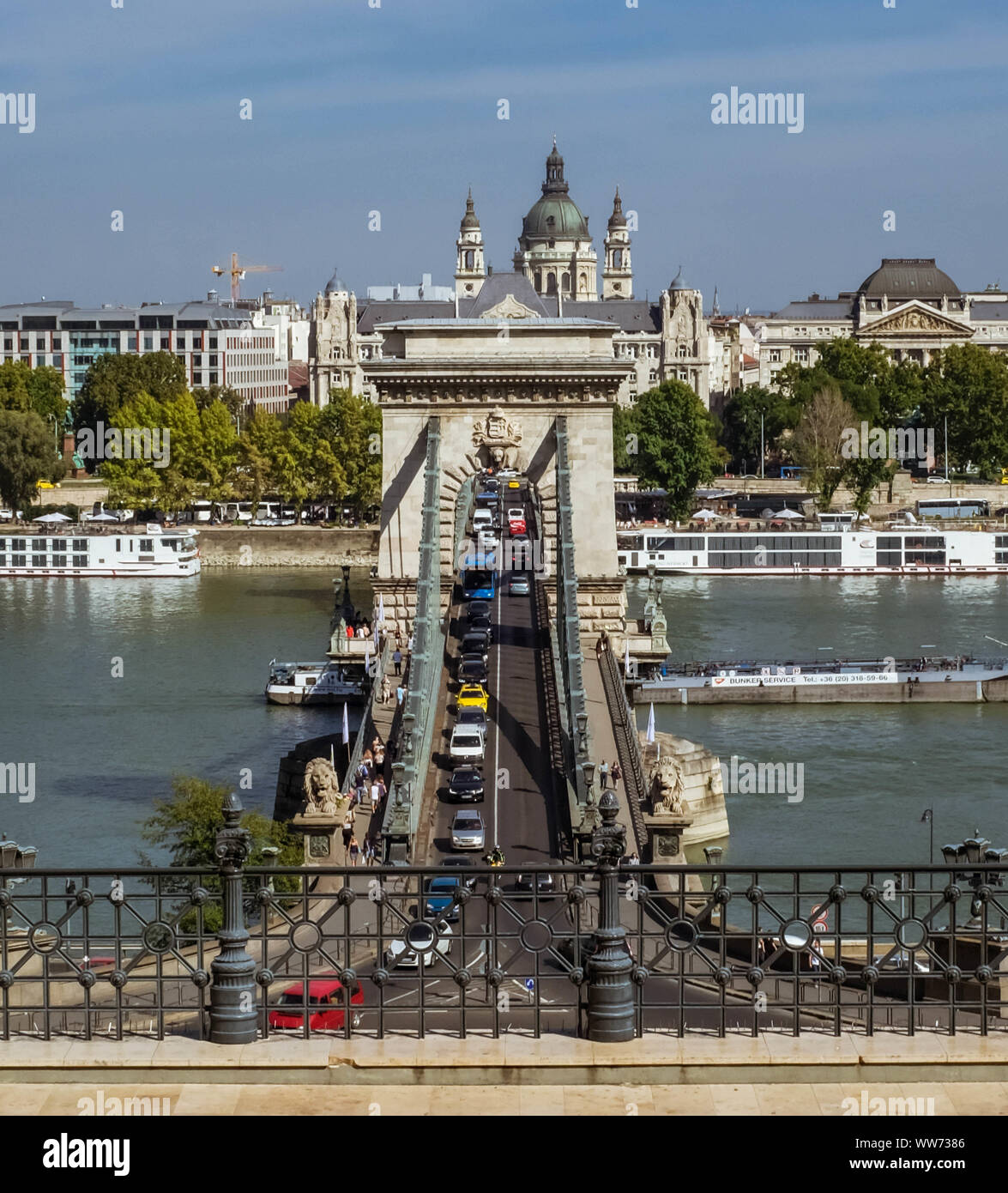 Cars crossing Budapest Chain bridge, a view from Castle hill tunnel platform. Stock Photo
