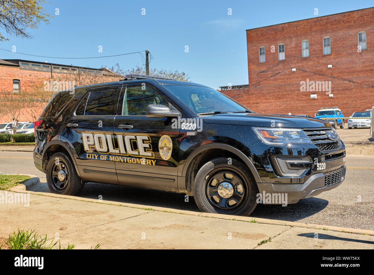 Black police SUV, Ford Explorer police interceptor, parked in downtown Montgomery, Alabama USA. Stock Photo