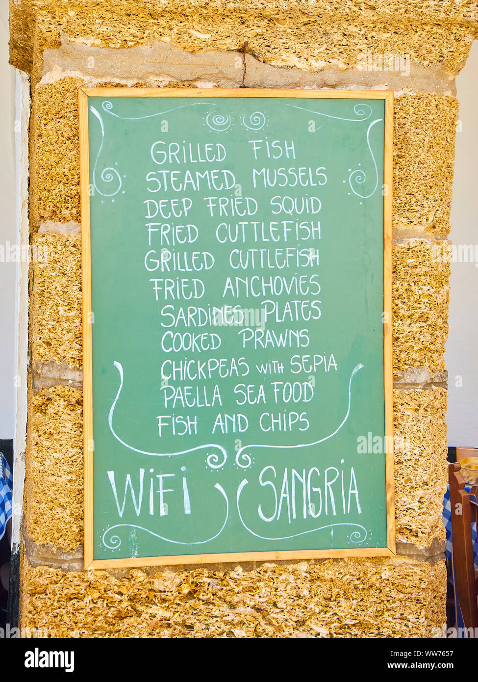 A blackboard offering typical Andalusian food. Cadiz. Andalusia, Spain. Stock Photo