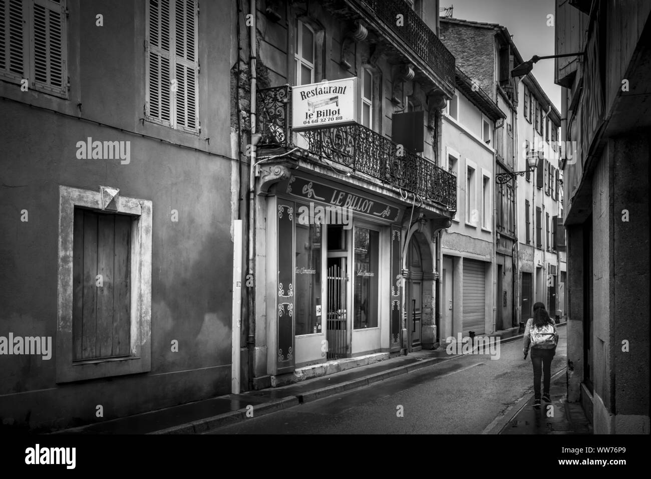 Narrow lane, town centre, springtime, Narbonne, Aude Department, Occitanie Region, France Stock Photo