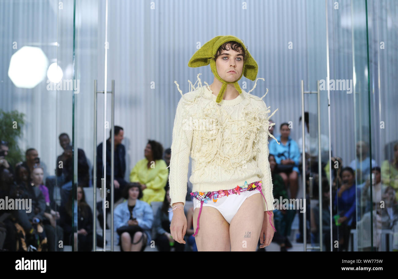 Models on the catwalk of Fashion East 