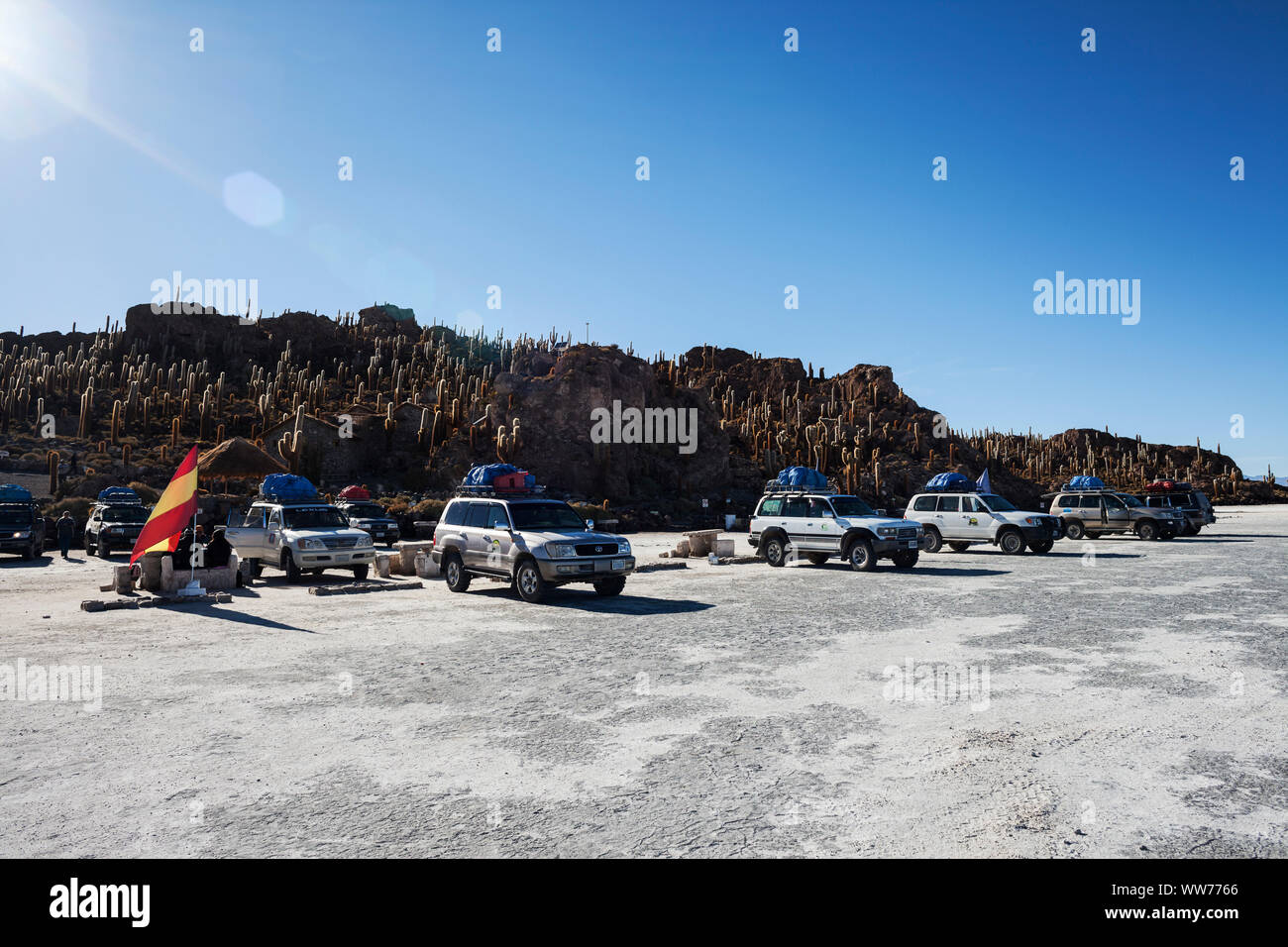 Bolivia, Uyuni, Salar de Uyuni Salt Flat, Isla Incahuasi, tourists with SUVs Stock Photo