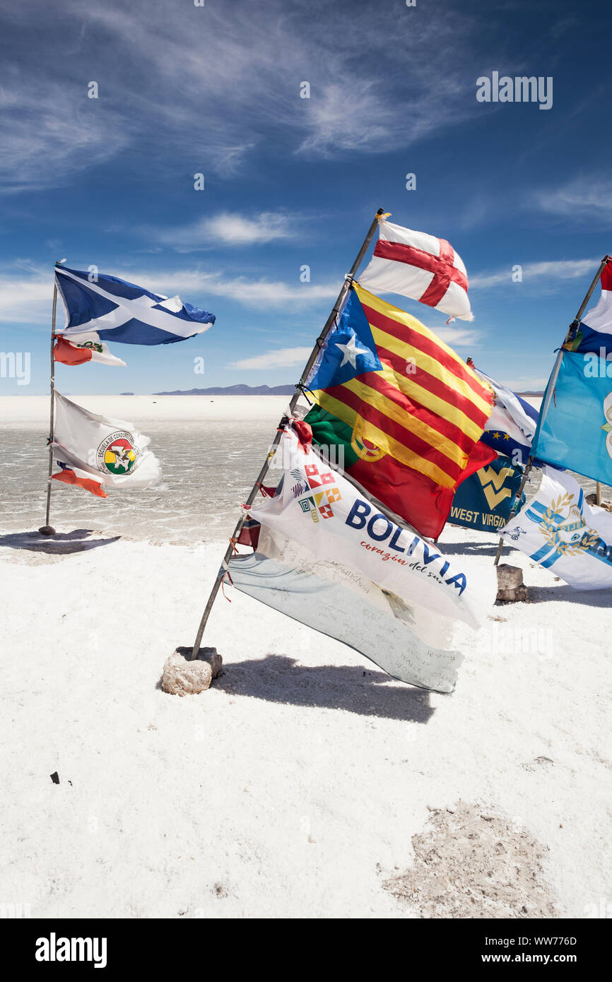 Bolivia, Uyuni, Salar de Uyuni Salt Flat, colourful flags, lakeside Stock Photo