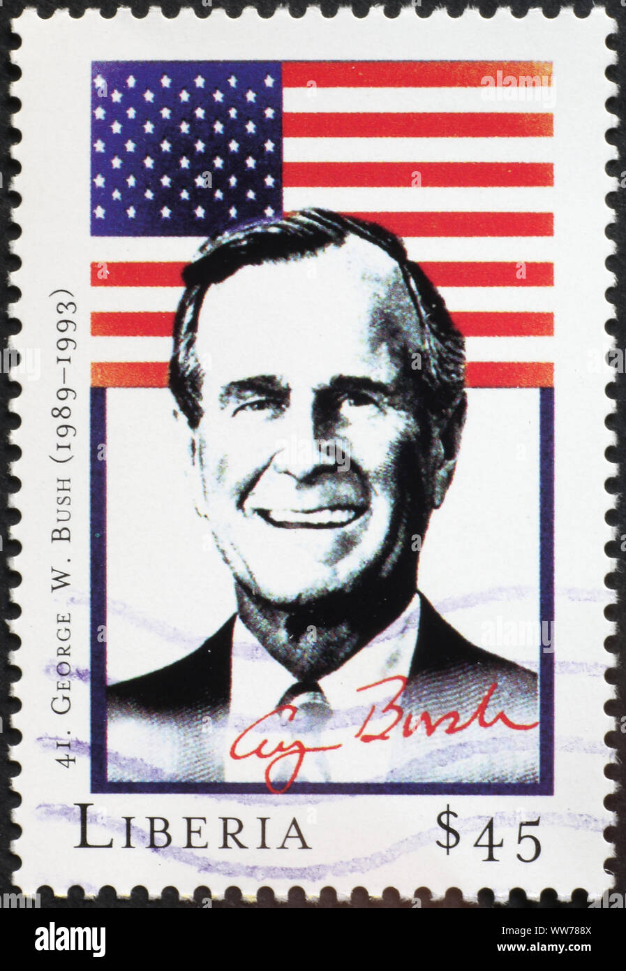 President George W. Bush and flag on postage stamp Stock Photo