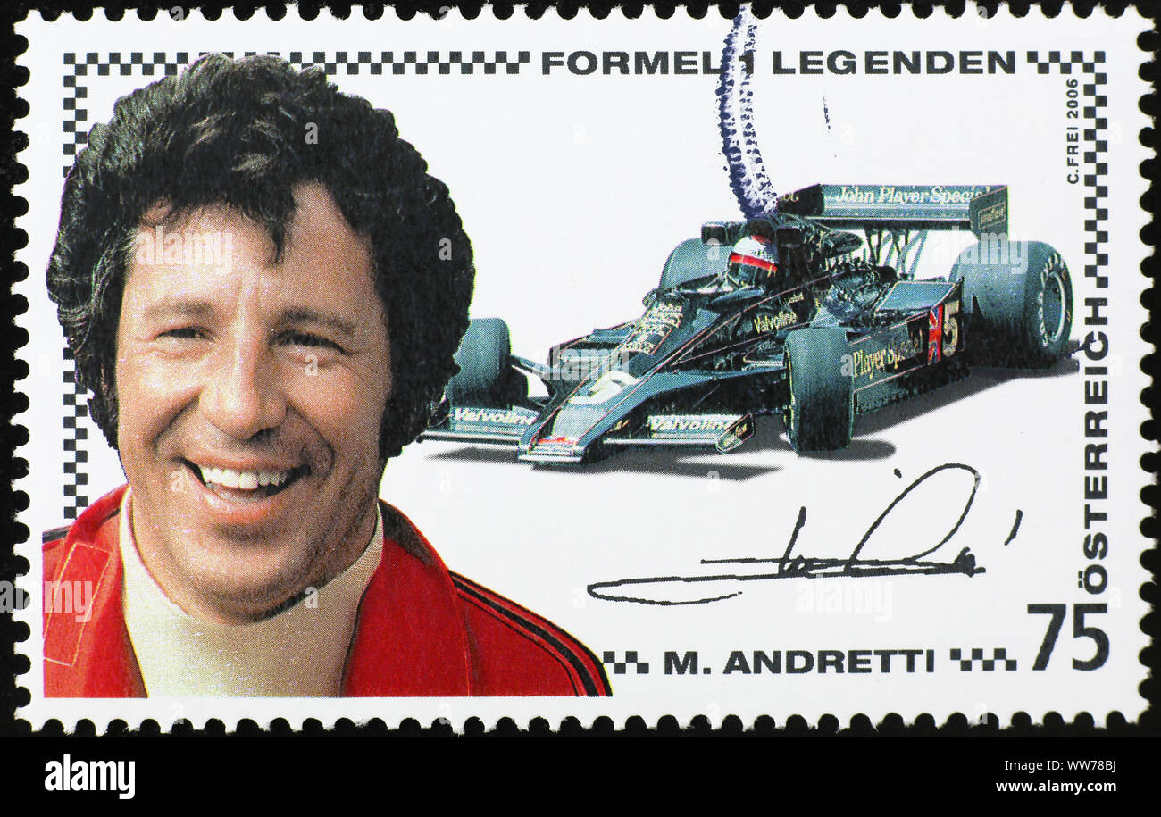 Racing driver Mario Andretti on postage stamp Stock Photo