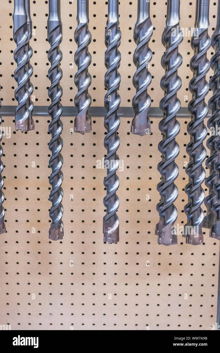 Various sizes of drill bits on display in a hardware store Stock Photo Alamy