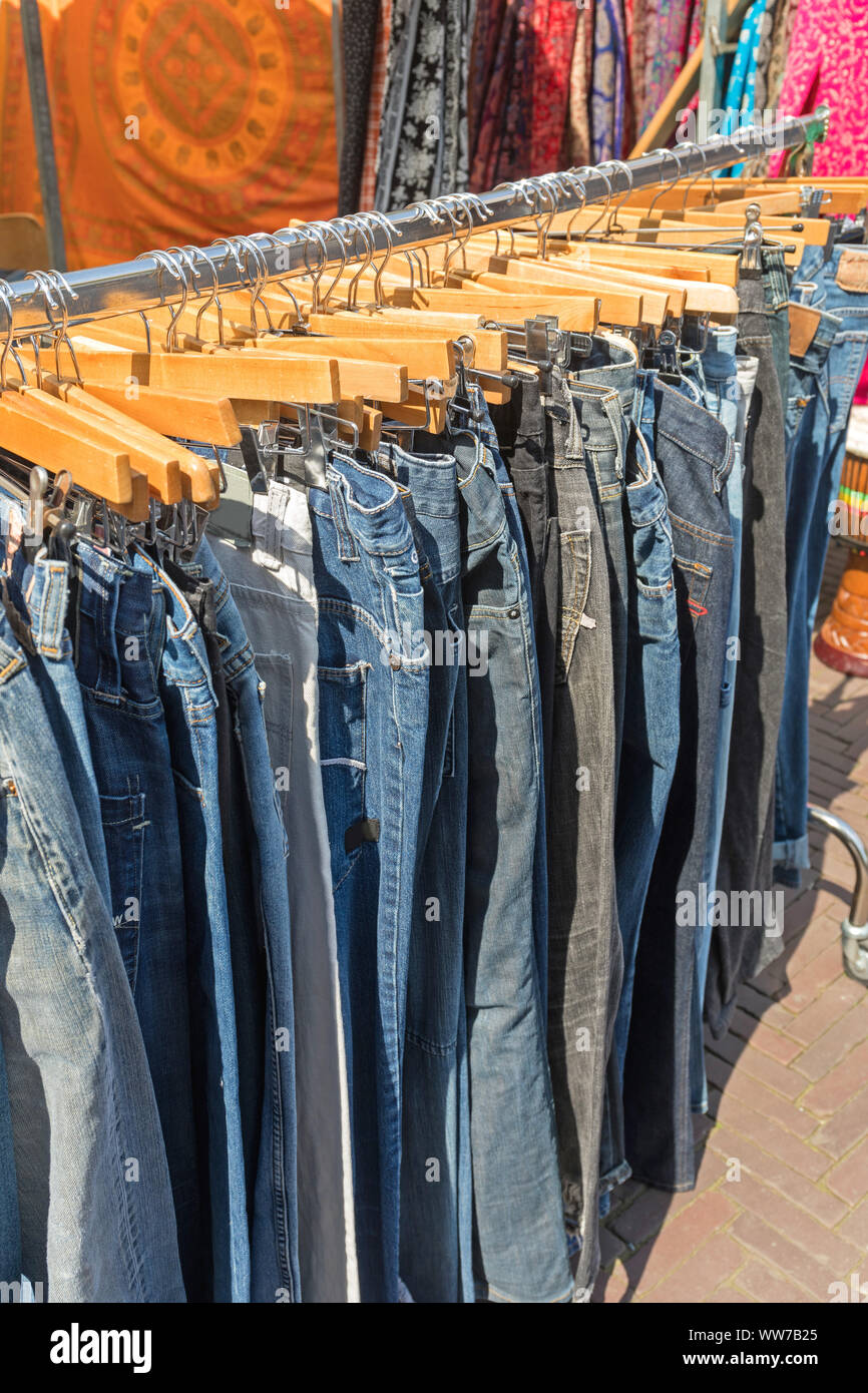 Second Hand Jeans Pants at Flea Market Stock Photo - Alamy