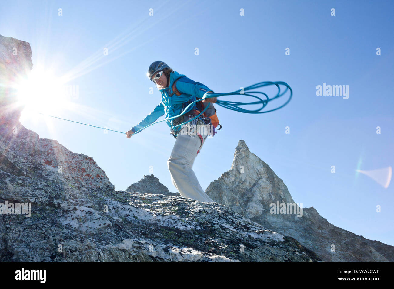 Climbing at the summit of Dent de Tsalion via Arolla, Val d'HÃ©rens, Valais, Switzerland Stock Photo