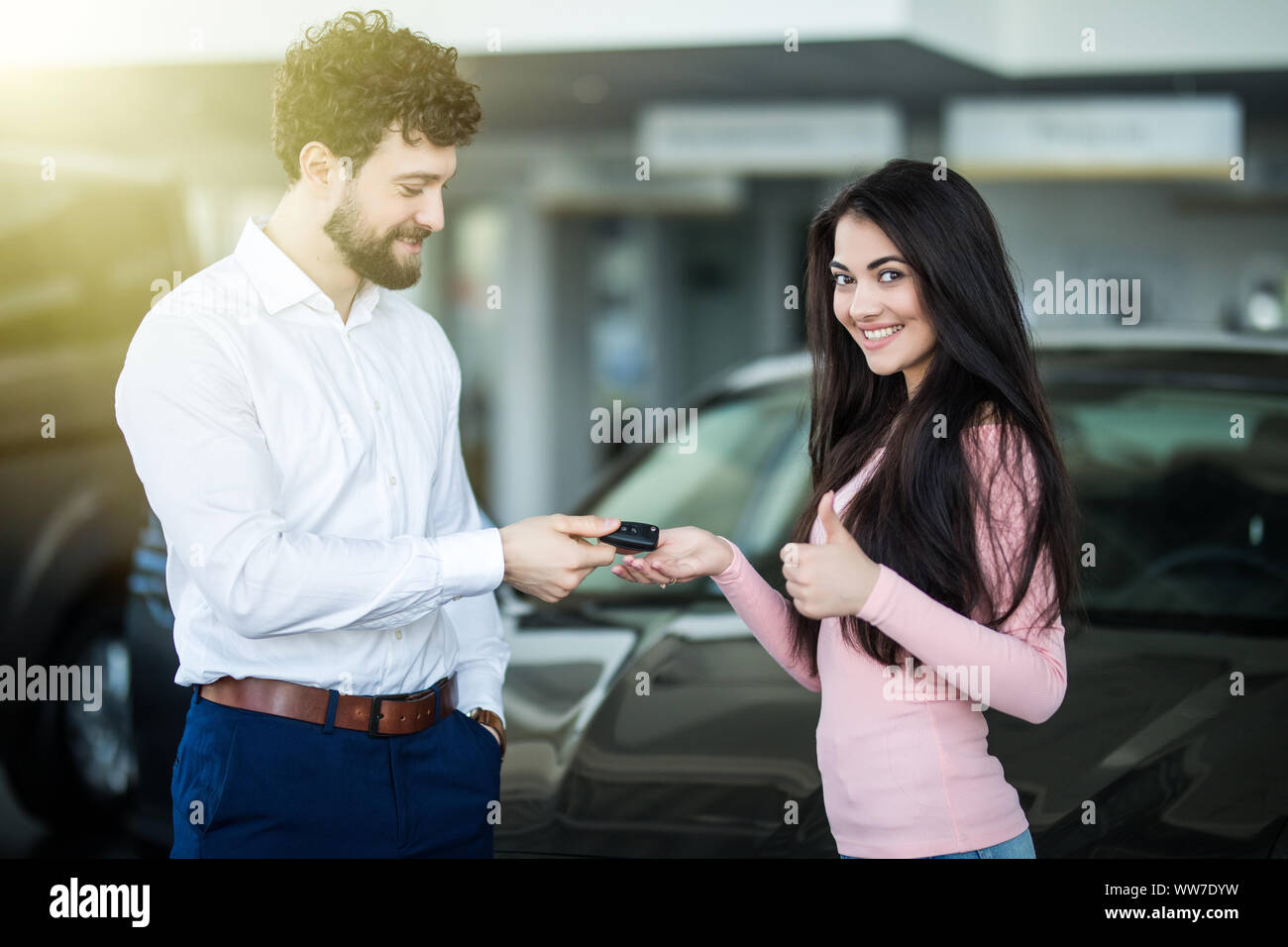 Handing car keys hi-res stock photography and images - Alamy