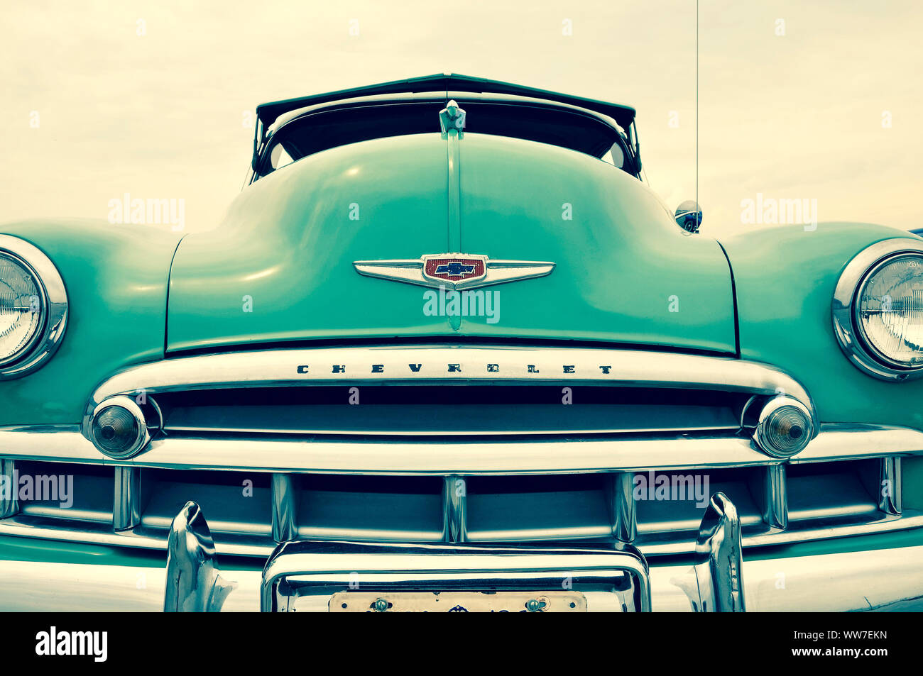 An image of classic, teal colored 1949 Chevrolet Fleetline vintage car. Stock Photo