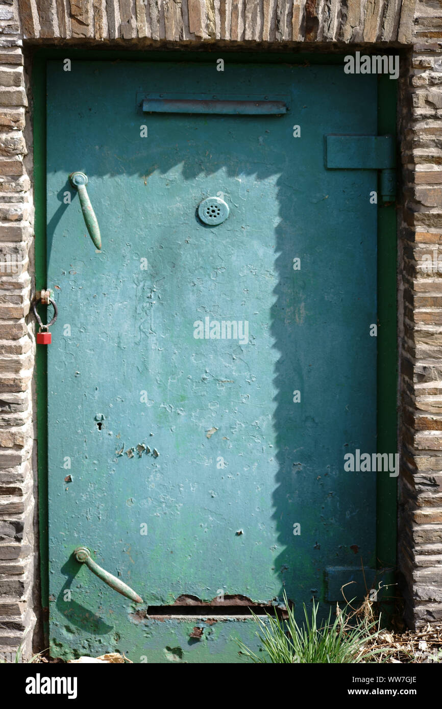 The heavy steel door and fireproof door of a bunker, Stock Photo