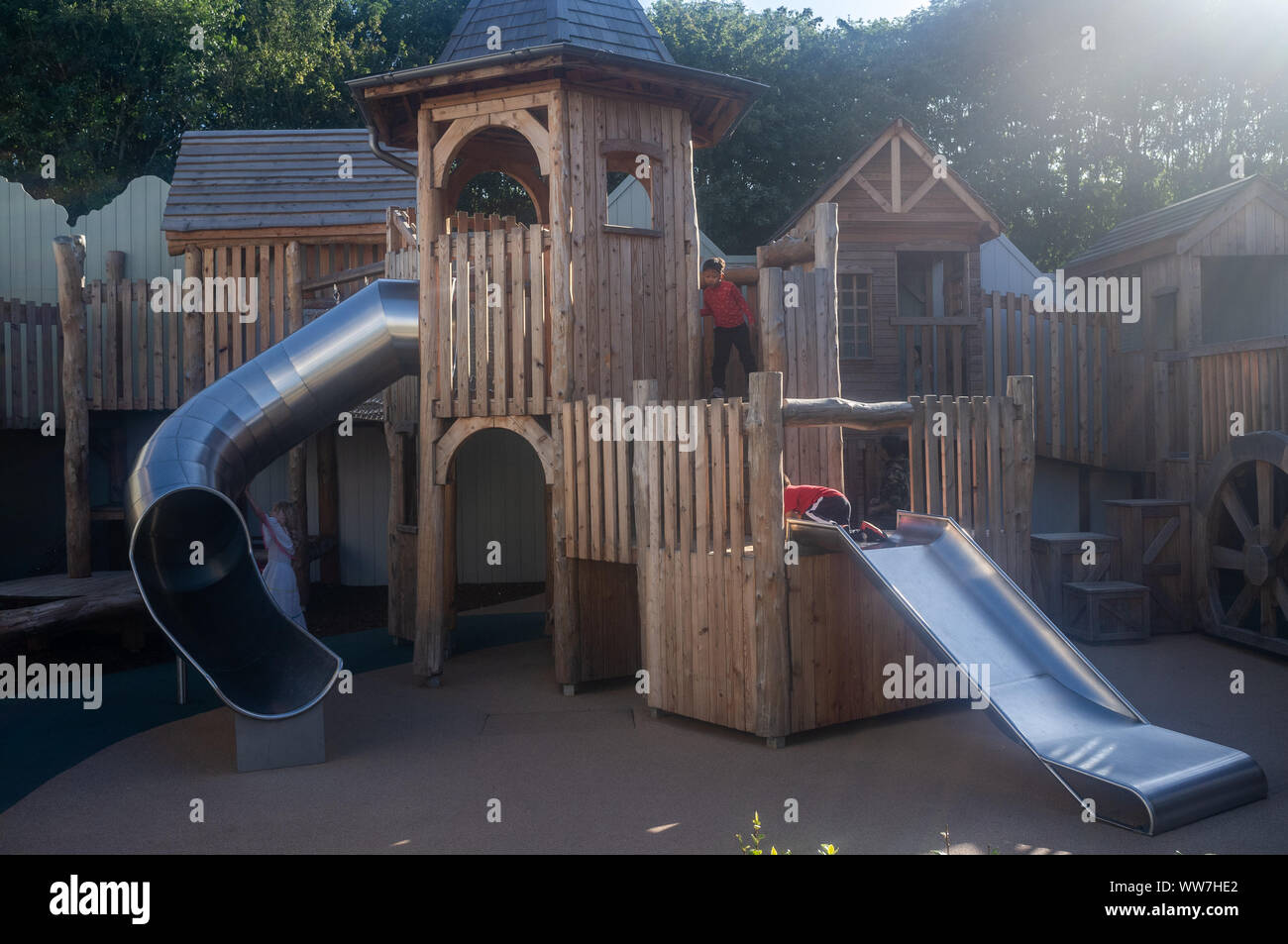 Children's play area at Bicester Village, Oxfordshire, UK. The playground is mainly made from wood, an eco sustainable product Stock Photo